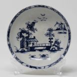 Blue & white saucer, long fence pattern.