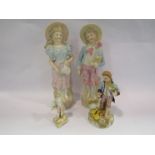 Four Continental ceramic figures including girl with watering can,