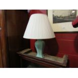 An Oriental style table lamp,