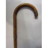 An 18ct gold collared walking stick