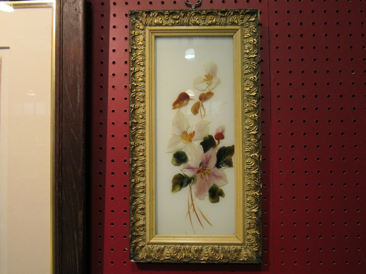 A pair of Edwardian gilt framed paintings of flowers on glass, 29cm x 11. - Image 2 of 2