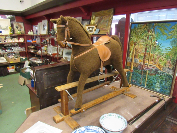 A Mamas & Papas soft bodied rocking horse,