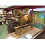 A Mamas & Papas soft bodied rocking horse,