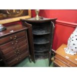 A George III oak bow front two door wall hanging corner cupboard with "H" hinges,