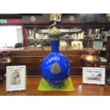 A Turkish twin handled cobalt blue ceramic vase with brass detail and turquoise roundels (modern