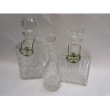 Two heavy glass decanters with ceramic spirit labels and another (3)