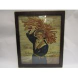 A late 19th Century woolwork depicting peasant with sticks, framed and glazed,