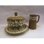 A Wedgwood brown ground cheese dome with lid, applied grapevine detailing,