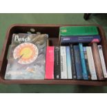 A box containing 1960's Punch magazines and assorted books