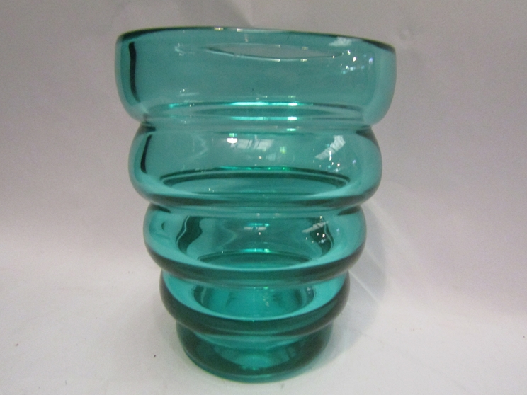 A green oval shaped glass vase, C.