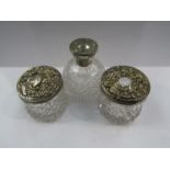 Three silver topped dressing table items