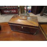 A 19th Century mahogany tea caddy with twin compartment,