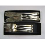 A set of twelve EPNS knives and forks