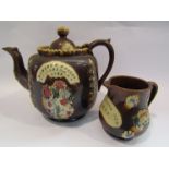 A Victorian Bargeware teapot and milk jug