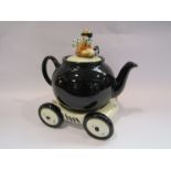 A Carters of Suffolk T44 racing car novelty teapot on stand