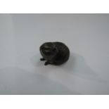 A miniature solid bronze hedgehog sniffing, boxed with certificate,