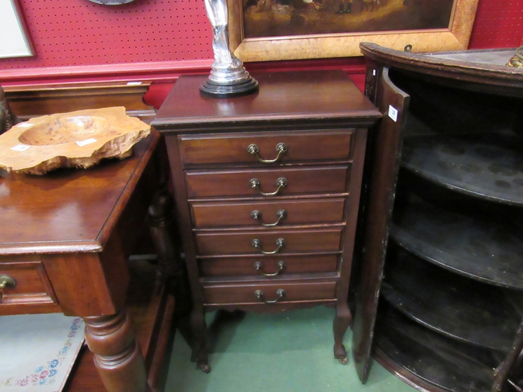 An Edwardian six drawer music cabinet,