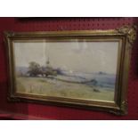 A watercolour depicting rural landscape, sheep grazing, gilt framed and glazed,