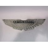 A reproduction Aston Martin polished wings mascot,