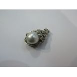 A white gold diamond pendant centrally set with large natural pale grey pearl, 3cm drop,