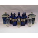 Five blue glass apothecary bottles,