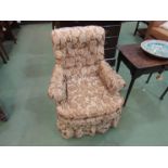 A Victorian Howard and Sons armchair,
