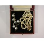A string of cultured pearls with pearl and amethyst cluster clasp 9ct,