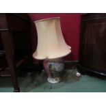 A Meissen porcelain table lamp with shade decorated with cartouches,