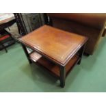 A Bevan and Funnel Georgian style mahogany two tier lamp table with gilt tooled leather shelves,