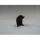 A miniature solid bronze hedgehog, boxed with certificate,