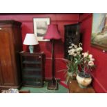 A 1930's mahogany standard lamp with faceted column and shade