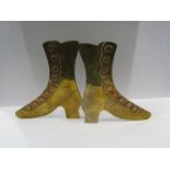 Two pairs of brass ornamental mantelpiece boots