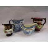 Four Victorian Staffordshire jugs