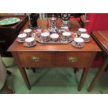 An 18th Century oak two drawer hall table on square tapering legs,