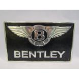 A reproduction black painted and highlight polish Bentley sign,