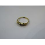 A gold ring set with five sapphires in rubover setting. Size O, 2.