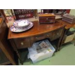 An early 19th Century mahogany bow front sideboard of small proportions,