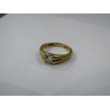 A gold ring set with a single diamond .35ct approx, stamped 18ct.