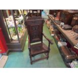 A 19th Century wainscot style carved oak chair,