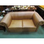 A modern two seater Chesterfield style sofa,