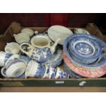 A box of mixed blue and white china tea and dinner wares