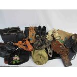 Two boxes containing a good quantity of early to mid 20th Century bags, handbags, purses and belts,