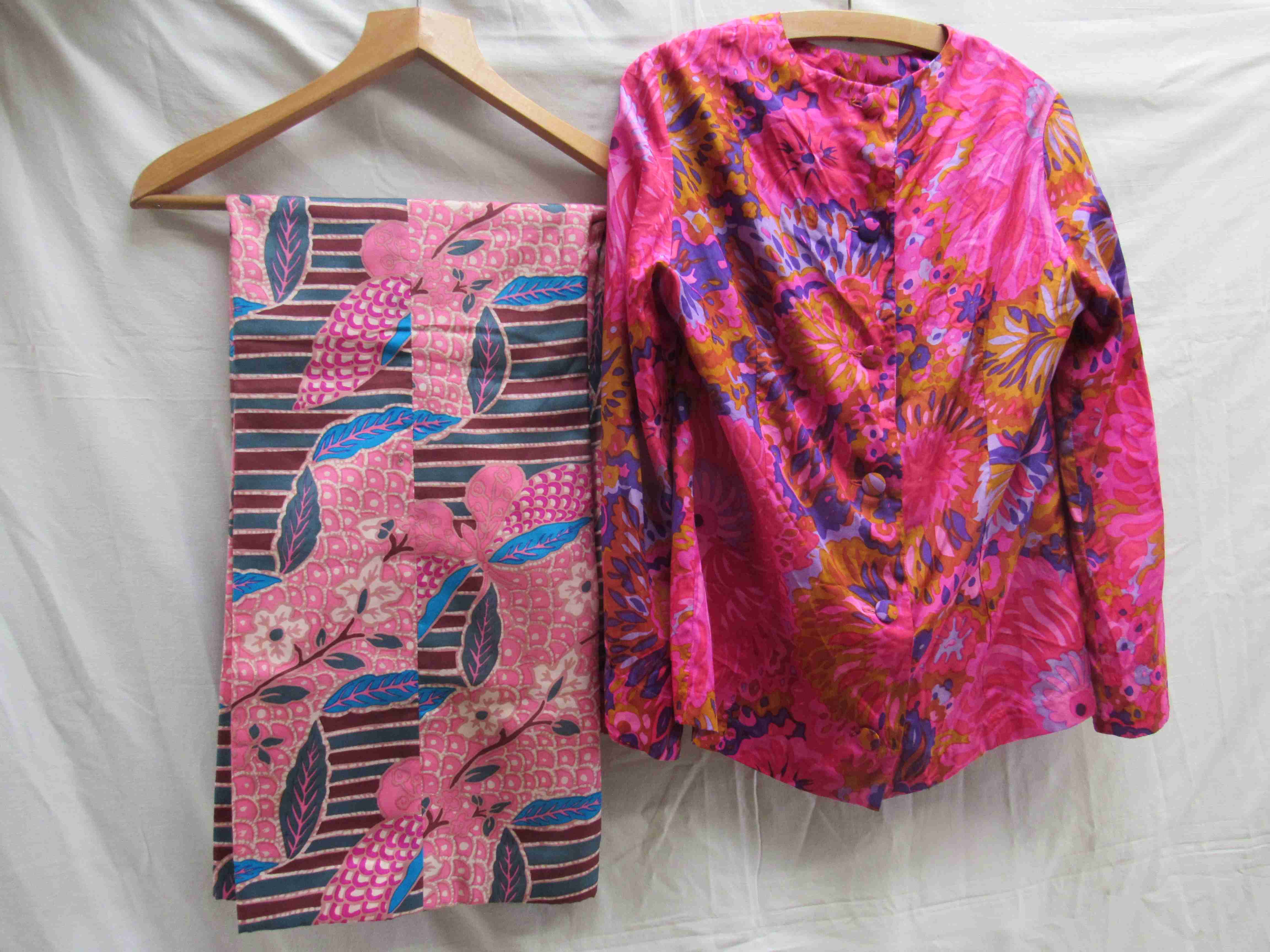 An Elida, London pure silk blouse and trouser suit, electric pink and purple floral pattern,