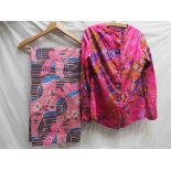 An Elida, London pure silk blouse and trouser suit, electric pink and purple floral pattern,