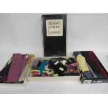 Three boxes containing gent's ties including an assortment of bow ties in a Hardy Amies box