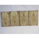 Four 19th Century silk gold ground hand embroidered panels of swags and baskets of flowers,