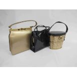 Two patent leather 1960's handbags n gold and in midnight blue and a binocular case shaped handbag