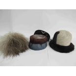 Four hats, a Marshall & Snelgrove plumed hat,