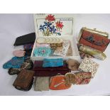 A selection of purses, wine coloured snakeskin,