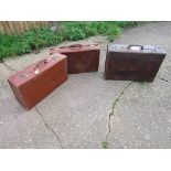 Three vintage leather suitcases "J.A.W.S.